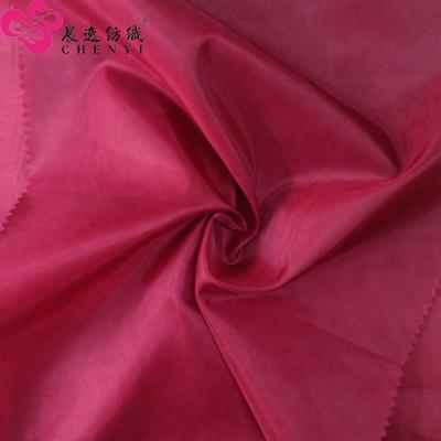 China Water Wave Waterproof 100% Polyester Woven Taffeta Fabric Plain Dyed Coating for sale