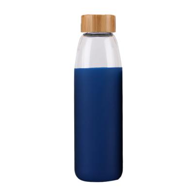 China Sustainable Glass Bottle Manufacturer Glass Water Drinking Bottle With Silicone Sleeves for sale