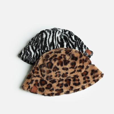 China 2020 Autumn Winter Fashion Wool Plush Zebra Bucket Hat Fisherman Hats Faux Fur Leopard Bucket Hat COMMON For Women for sale