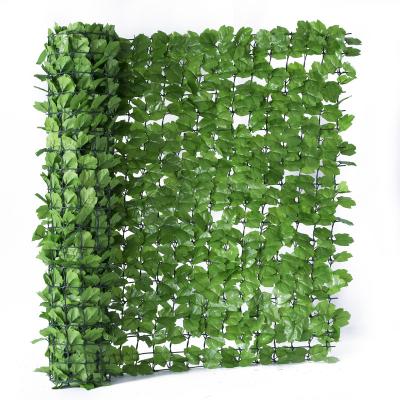 China Simple installation easily assembled with the use of plastic green leaves fence for balcony and terrace for sale