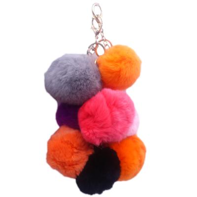 China Different Designs Shapes Colorful 8CM Pom Pom Puff Furball Womens Girly Key Chain For Bags Pendant for sale