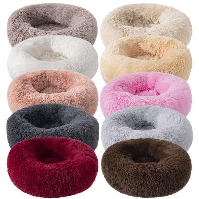 China Luxury Pet Bed Stylish Round Shape Autumn And Winter Sofa Bed Mat Dog Kennel Cama Para Mascotas Soft Plush Keep Donut Warm Pet Bed for sale