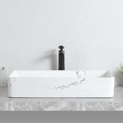 China Modern Special Hot Selling Ceramic Wash Basin Table Top Rack Designs for sale