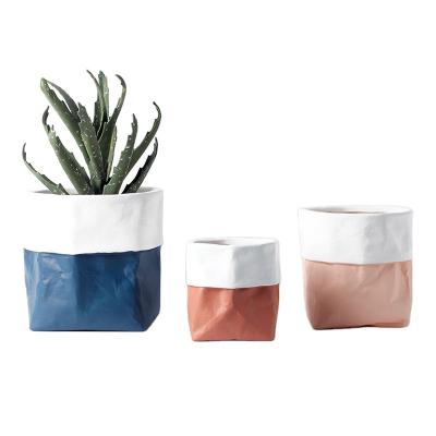 China Europe 2023 cheap indoor flower simulation kraft paper bag design ceramic flowerpot pots and planters for garden for sale