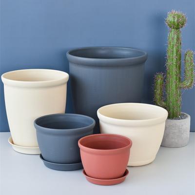 China Europe Chinese factories produce and wholesale cheap resin round ceramic flower pots in different sizes for ceramic planting for sale