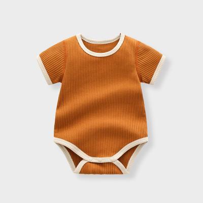 China Hot Selling Simple Onesie Home Loungewear High Quality Organic Cotton Romper For Babies Jumpsuit Clothes for sale