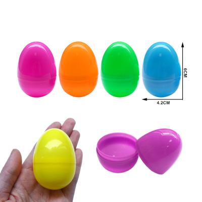 China Egg Shaped PP Colorful Plastic 6*4.2CM Egg Shaped Surprise Bottle Cap Shell for sale