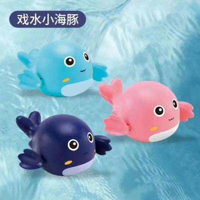 China Wind Up Dolphin Bath Toy Boys Girls Baby Bath Time Animal Wind Swimming Float Toy For Kids Manufacturers for sale