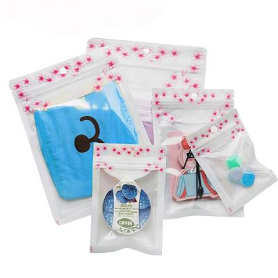 China Recyclable in Stock and Custom Preprinted Clear Front White 3 Pouches Side Seal Plastic Resealable Zipper Packaging Bags with Hang Hole for sale