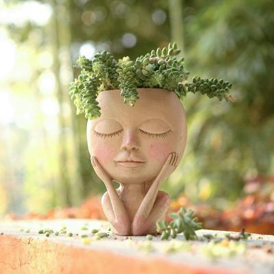 China Cute Resin Flower Pot Face Flower Pot Oval Head Succulent Planter Pot Resin Cactus Planter With Drainage Hole Closed Eyes for sale