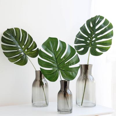 China Wholesale Eco-Friendly Diy 40cm Large Size Indoor Artificial Tropical Leaves 60cm Green Turtle Plam Grow Leaves Artificial Leaves For Decoration for sale