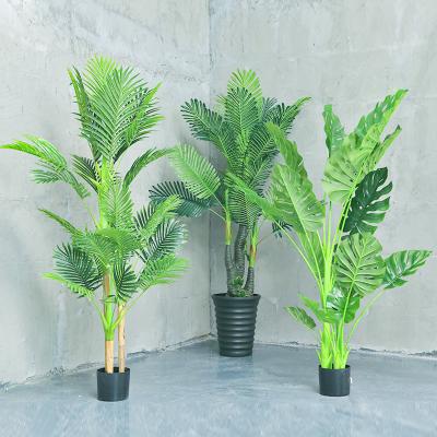 China Environmentally Friendly Synthetic Trees Plastic Artificial Indoor Leaves Plastic Fake Plam Plant Garden Bonsai Plants Decorative Natural Tree Decor Home for sale