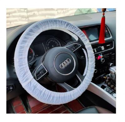 China Basic Without The New Fashion Design White And Black High Quality Car Disposable Nonwoven Steering Wheel Cover for sale