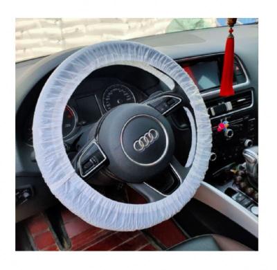 China Basic Without Design Wholesale Cheap White And Black Disposable Non Woven Car Steering Wheel Cover for sale