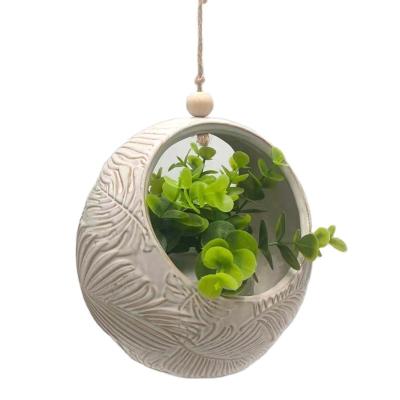 China Eco-friendly Nordic style indoor decorative handmade wall hanging ceramic planters flower pots for home decoration for sale