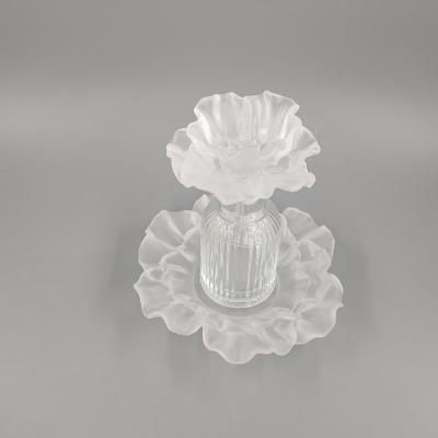 China European style crystal perfume bottle from Europe with colorful crystal flower head and crystal base for sale