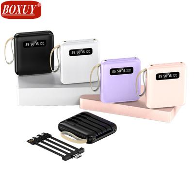 China With charging cable factory wholesale 1 to 4 output with 2USB output comes with 1 to 4 powerbanks 10000mah mini output cable charging 15000 mah for sale