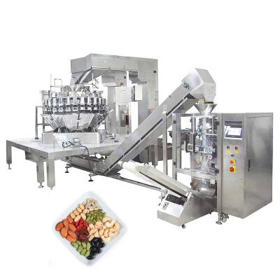 China Full Automatic Frozen Vegetable Food Peanuts Beverage Mixer Vertical Packing Machine With Sector 4 Different Weighting Packing Machine for sale