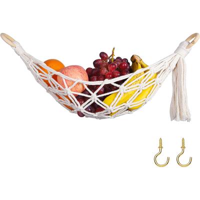 China Sustainable Kitchen Storage Macrame Wall Hanging Under Cabinet Hanging Fruit and Veggie Net Macrame Fruit Hammock for sale