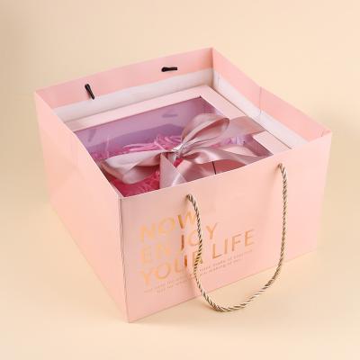 China Recycled Materials Gift Box Retail Luxury Skin Care Set Packaging Gift Box With Clear Window for sale