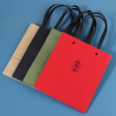 China Recyclable Kraft Paper Netting Bag Customized Handle Portable Luxury Paper Shopping Gift Bag for sale