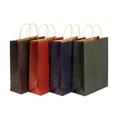 China Custom Made Custom Recyclable Eco Blue Restaurant Luxury Shopping Kraft Paper Bag With Handle Paper Bag for sale