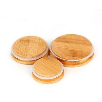 China Wholesale Child Safe Bamboo Wooden Cup Lid Silica Gel Sealing Ring Lid For Glass Container Candle Jar Custom Logo Cup Lid for sale