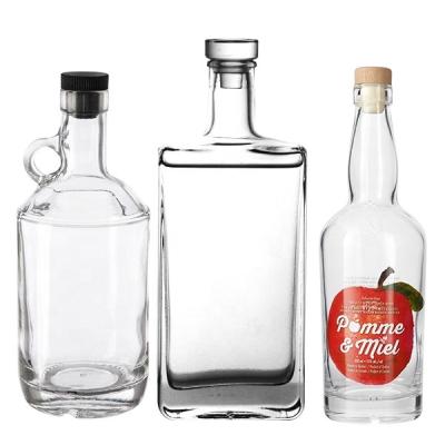 China Botella Clear Spirit 500Ml 750Ml 1000M Square Liquor Glass Empty Bottle Customized Beverage Para Licor With Screw Lid Manufacturer for sale