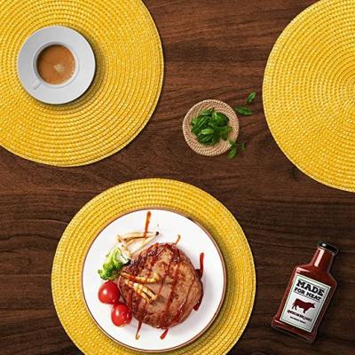 China Durable 13 Inch Round PP Woven Heat Resistant Washable Yellow Non-Slip Place Mats Set Of 6 Table Mats for sale