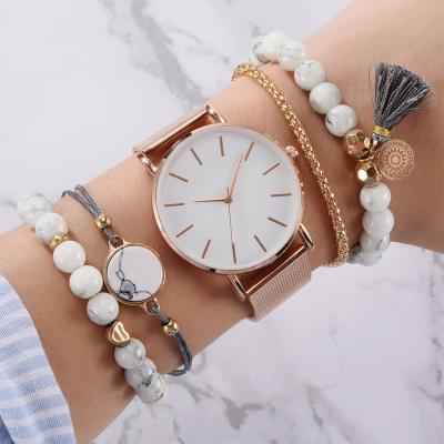 China Simple DIVER Yishi New Ladies Watch Set Trend Alloy Steel Band Watch With Two Piece Bracelet Wholesale for sale