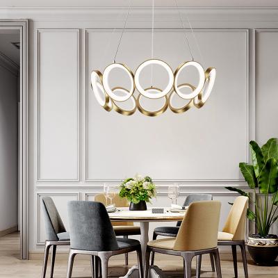 China Modern Nordic Design Living Room Chandelier Ring Modern Led Creative Gold Light Luxury Bedroom Dining Chandelier for sale