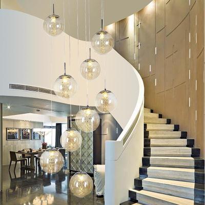 China Creative Rotating Luxury Duplex Crystal Staircase Modern Art Chandelier Restaurant Lighting Living Room Chandelier for sale