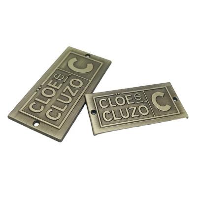 China Stainless Steel Geometry High End High Quality Custom Alloy English Custom Brand Name Badges Metal Logo Badge for sale