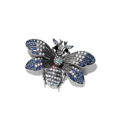 China Creative Fashion Creative Fashion Custom Design Jewelry Gun Black Alloy Rhinestone Animal Bee Brooch for sale