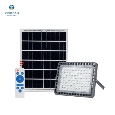 China Outdoor ROAD slim IP65 100w portable outdoor waterproof solar light led solar floodlight solar flood lamp for sale