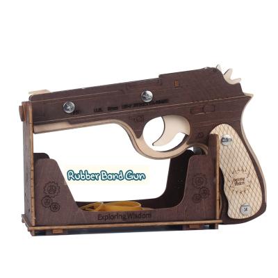 China DIY Wisdom Exploring Building Toys Mechanical Fashion Rubber Band Wooden Gun with Targets TSZH002 for sale