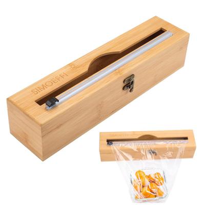 China Desk 1 Slot Kitchen Drawer Aluminum And Plastic Wrap Reusable Bamboo Dispenser Organizer With Slide Cutter for sale