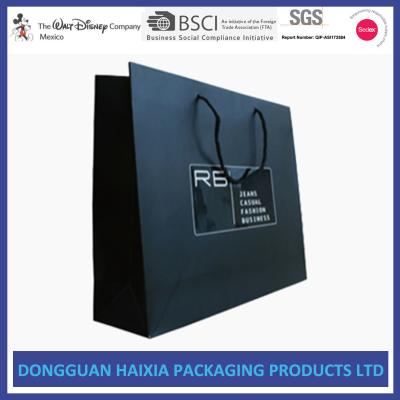 China Glossy Varnishing Small Kraft Paper Bags , Printed Paper Bags With Rope Handle for sale