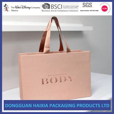 China Glossy Laminated Kraft Paper Shopping Bags Custom Color Gift Shopping Bag for sale