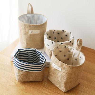 China Sustainable Wholesale Eco-friendly Round Small Burlap Nature Jute Cotton Storage Bag Storage Basket With Hanger for sale