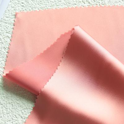 China 50D*50D 100% T memory imitation acetic acid plain elastic satin fabric for women cloth for sale