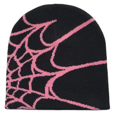 China JOINT Wholesale Customized Beanies Hats All Over Logo Knitted Jacquard Winter Skull Beanie for sale