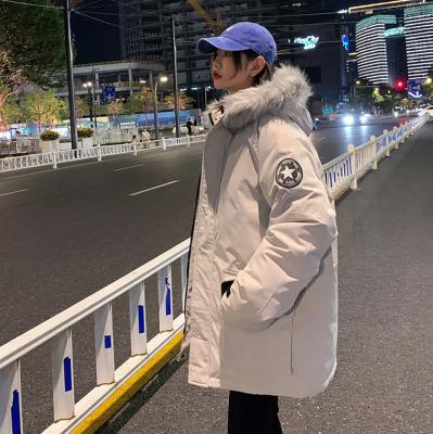 China Anti-wrinkle large hair collar embroidery couple solid color loose white duck down jacket men and women the same style for sale