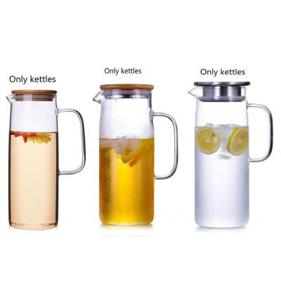 China Viable Wholesale Handmade Borosilicate Drinking Glass Water Pitcher Heat Resistant Jug With Filter Lid for sale