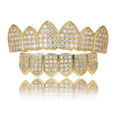 China Non-erasing European and American fashion accessories vampire teeth, unique style of hip-hop accessories gold personalized teeth for sale