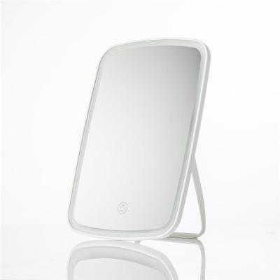 China Lighted Makeup Mirror With Portable LED Light R Hand Cosmetic Light Up Mirror for sale