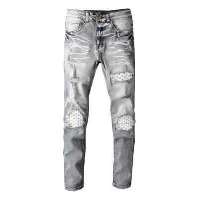 China Workable patch stretch fabric embroidery fashion slim feet ripped design pants men's jeans for sale