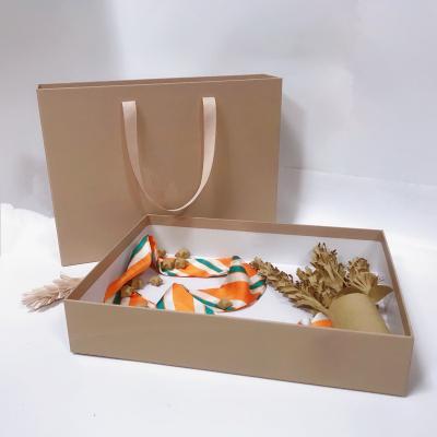 China Handmade Simple Convenient Printing Drawer Gift Packaging Matte Coated Paper Box With Portable Ribbon for sale