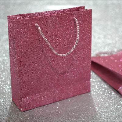 China Recyclable Custom Rose Thick Paper Gold Powder Gift Sack Bag for sale