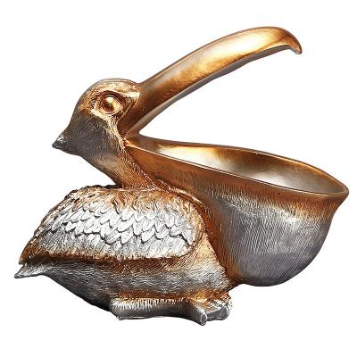 China Art Decor European Style Boastful Pelican Bird Ornaments Home Decoration Accessories Living Room Modern Luxury Key Storage Containers for sale